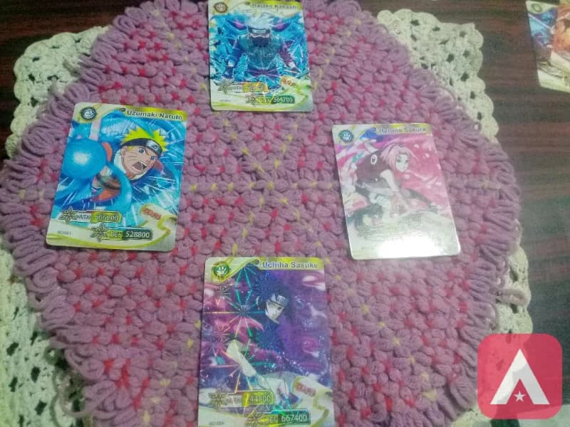 Team 7 naruto card that includes kakashi, naruto, sasuke, sakura